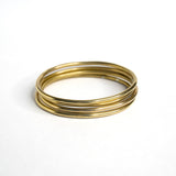 Shield brass bangles
